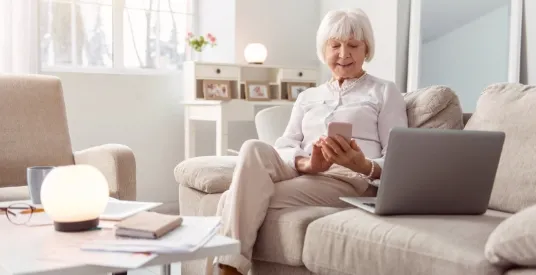 older woman using laptop