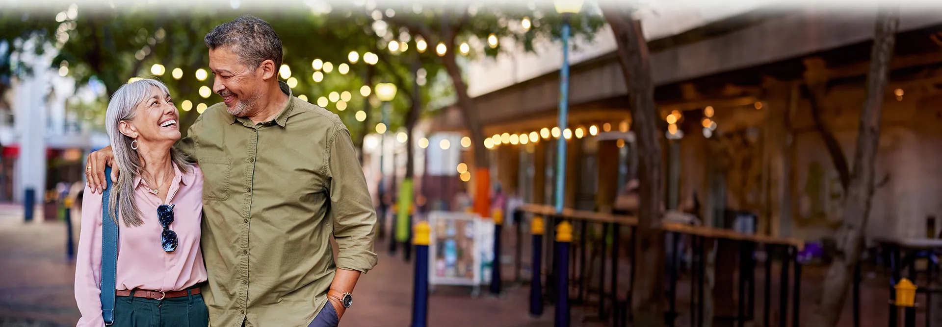 older couple walking downtown