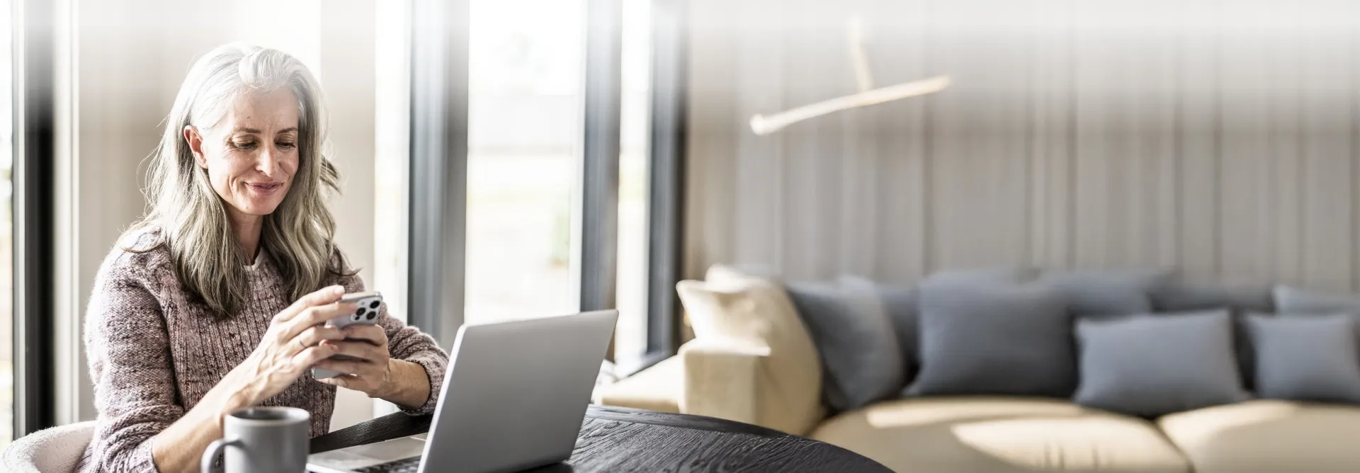 woman using phone to schedule an appointment
